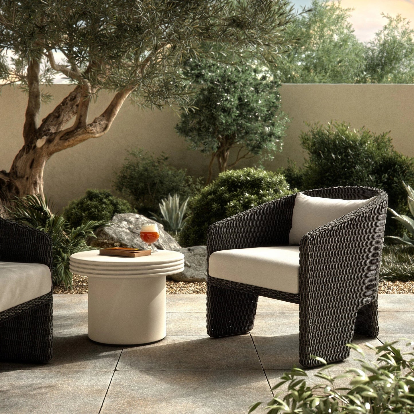 028 SI-2137313 | Lifestyle | Fae Outdoor Chair by Four Hands in stinson white. Made from 100% olefin, 100% polyethylene, 91% polyurethane foam pad, 9% polyester fiber batting in a modern style.