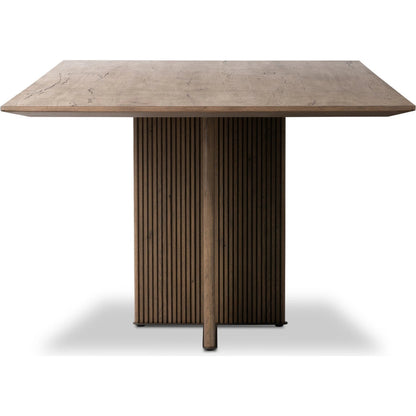 Leo Dining Table by Four Hands in rustic grey. Made from thick oak veneer, solid oak, iron in a modern style.