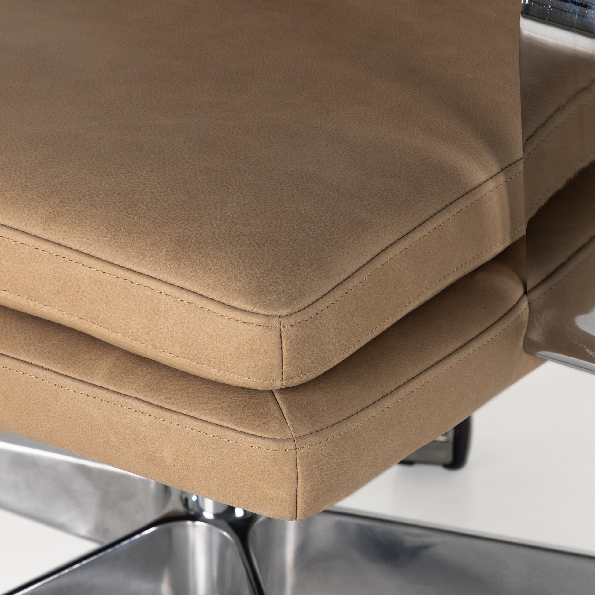 Jude Desk Chair by Four Hands in palermo nude. Made from top grain leather, aluminum, stainless steel in a transitional style.