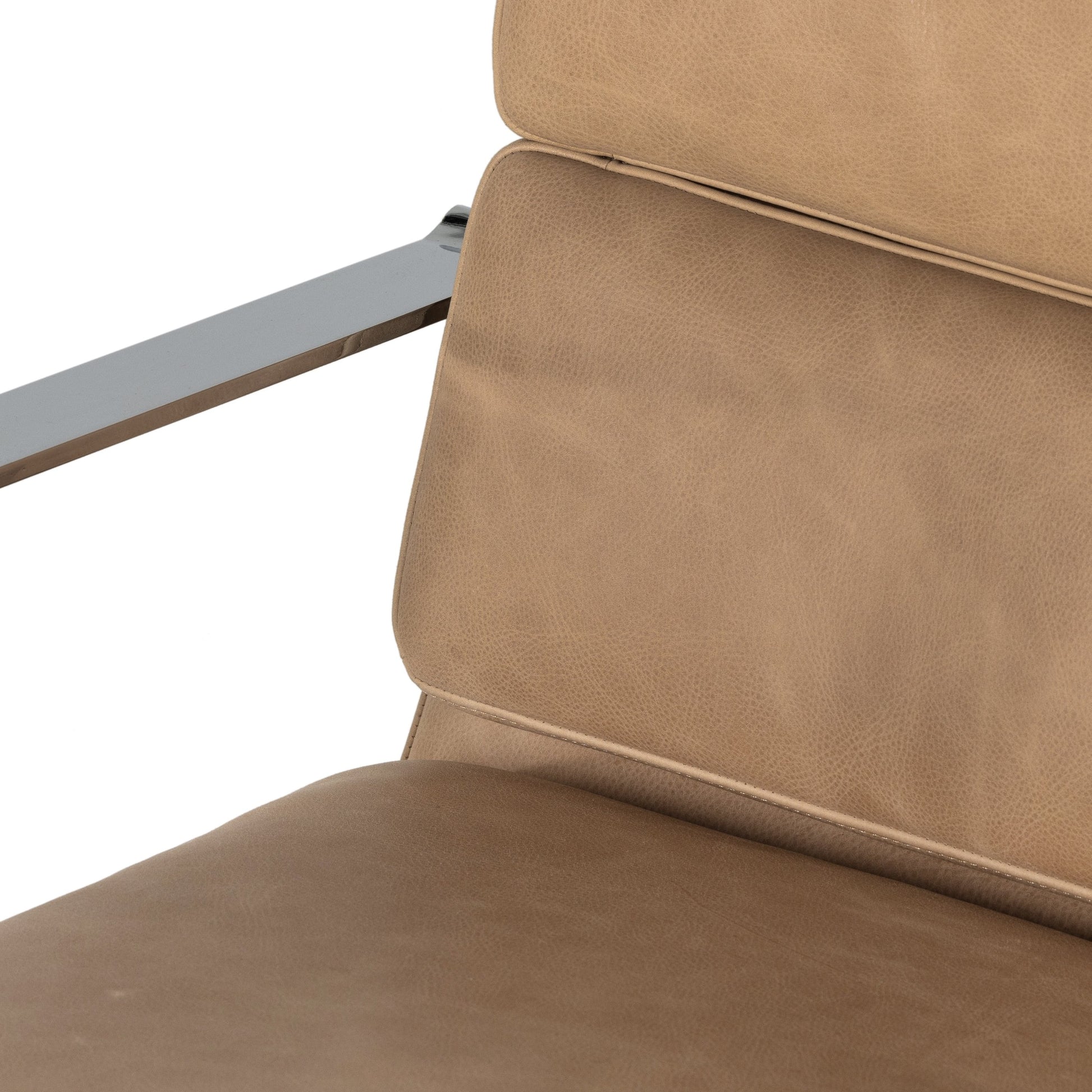 Jude Desk Chair by Four Hands in palermo nude. Made from top grain leather, aluminum, stainless steel in a transitional style.