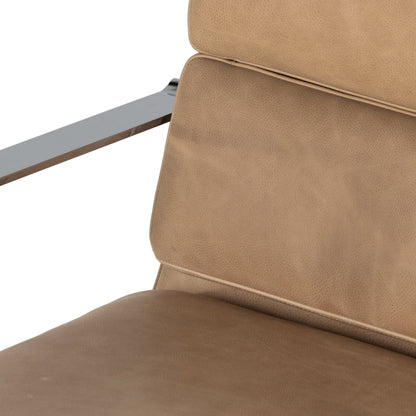 Jude Desk Chair by Four Hands in palermo nude. Made from top grain leather, aluminum, stainless steel in a transitional style.