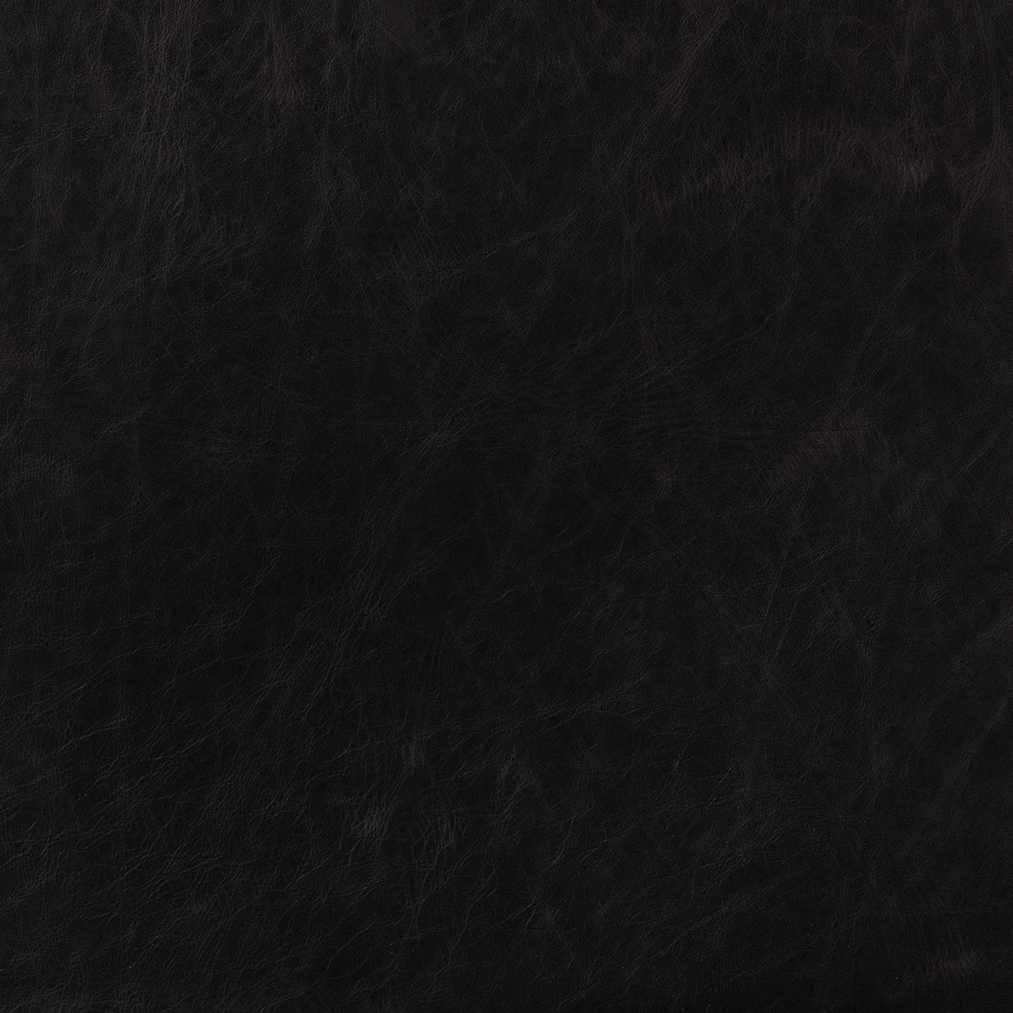 005 SI-1977440 | Closeup | Kena Dining Chair by Four Hands in sonoma black, vintage natural. Made from top grain leather, solid parawood in a modern style.