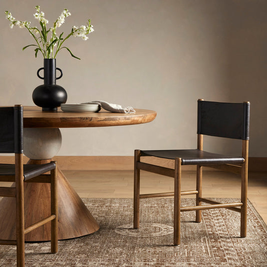 Kena Dining Chair by Four Hands in sonoma black, vintage natural. Made from top grain leather, solid parawood in a modern style.