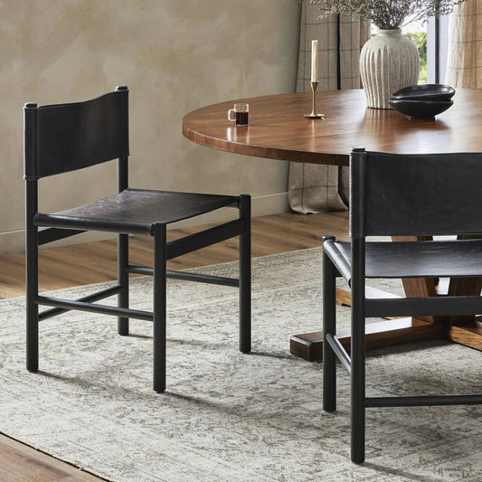 Kena Dining Chair by Four Hands. Made from top grain leather, solid parawood in a modern style.