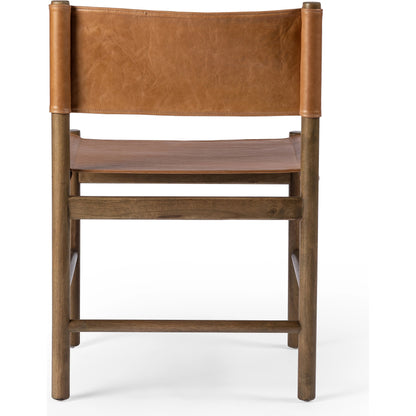 Kena Dining Chair by Four Hands. Made from top grain leather, solid parawood in a modern style.