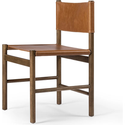 Kena Dining Chair by Four Hands. Made from top grain leather, solid parawood in a modern style.