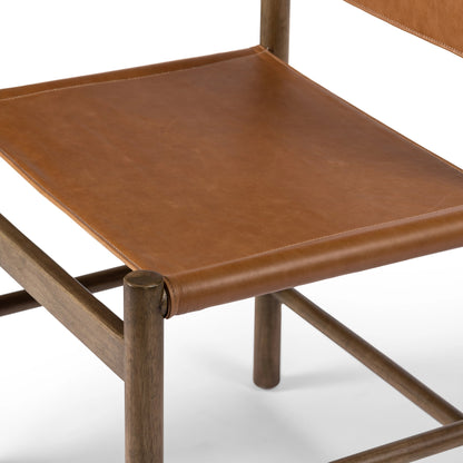 Kena Dining Chair by Four Hands. Made from top grain leather, solid parawood in a modern style.