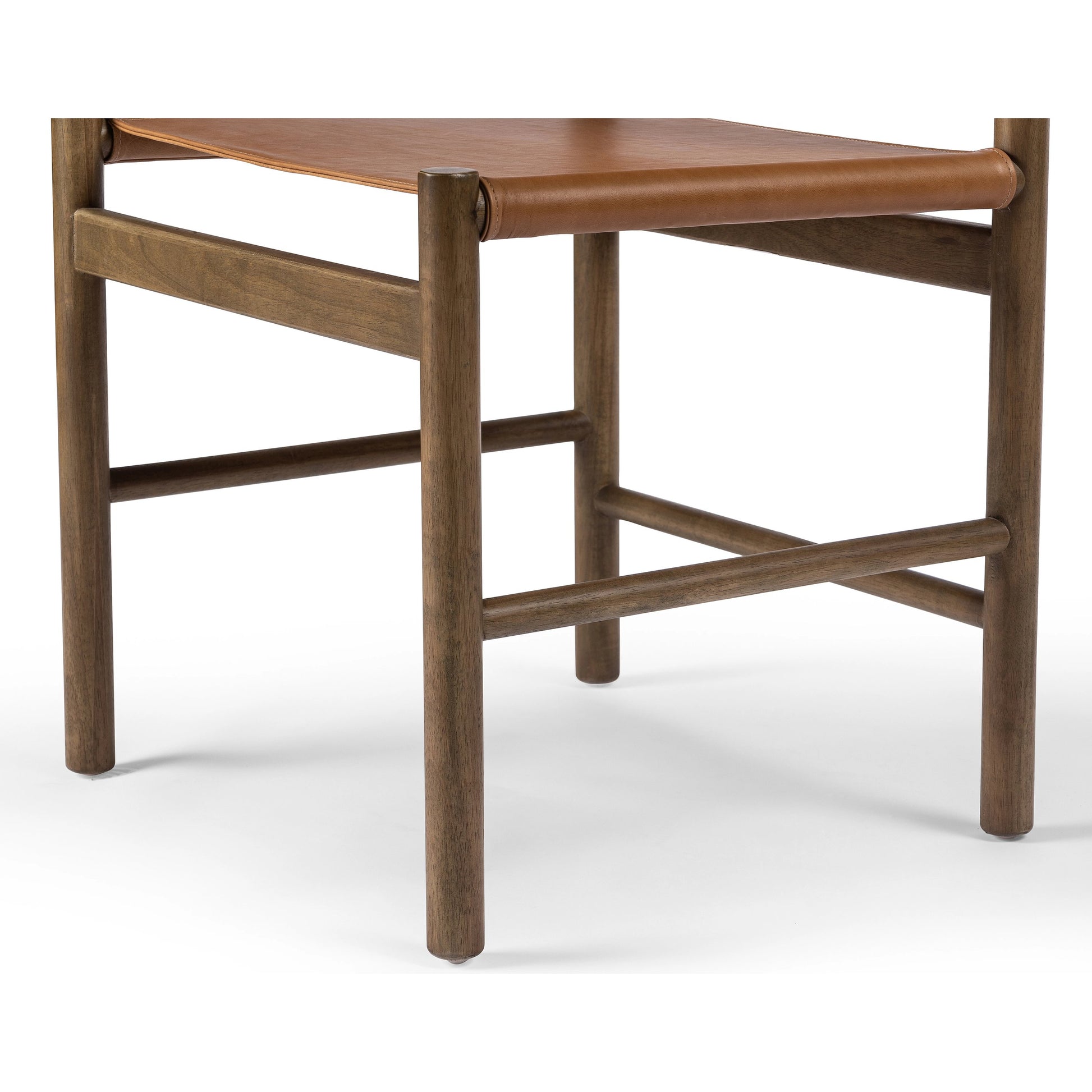 Kena Dining Chair by Four Hands. Made from top grain leather, solid parawood in a modern style.