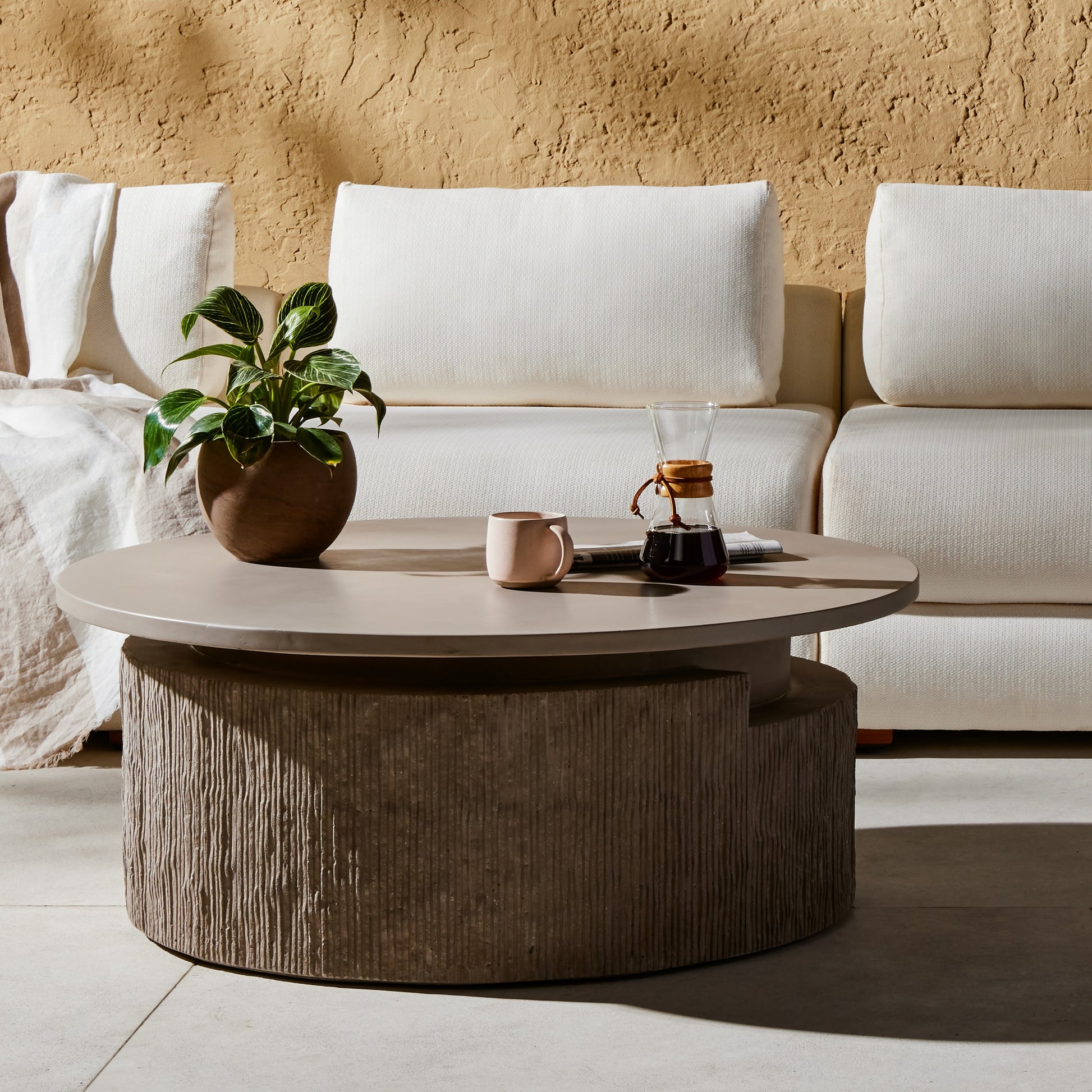 Huron Outdoor Coffee Table by Four Hands in flint. Made from concrete in a modern style.
