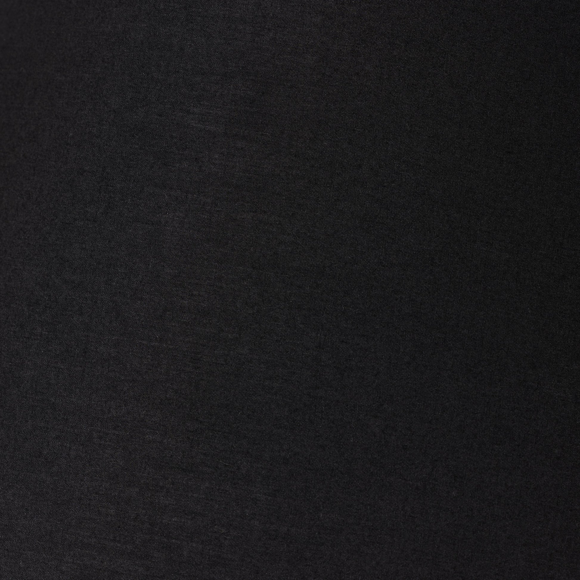 Muji Table Lamp by Four Hands in textured matte black porcelain ceramic, ivory linen. Made from ceramic, 65% polyester, 35% flax, linen, thermoplastic in a modern style.