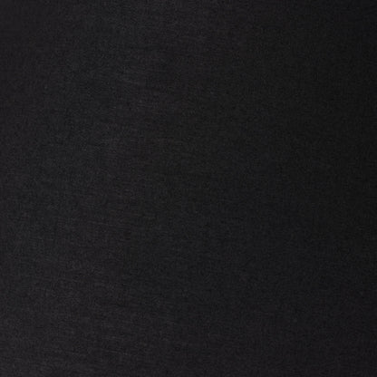 Muji Table Lamp by Four Hands in textured matte black porcelain ceramic, ivory linen. Made from ceramic, 65% polyester, 35% flax, linen, thermoplastic in a modern style.