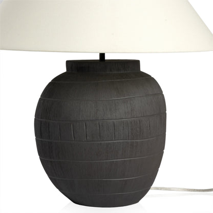Muji Table Lamp by Four Hands in textured matte black porcelain ceramic, ivory linen. Made from ceramic, 65% polyester, 35% flax, linen, thermoplastic in a modern style.