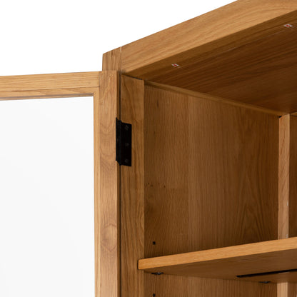 Laker Cabinet by Four Hands in black oak. Made from solid oak, rush, oak veneer in a cottage & farmhouse style.