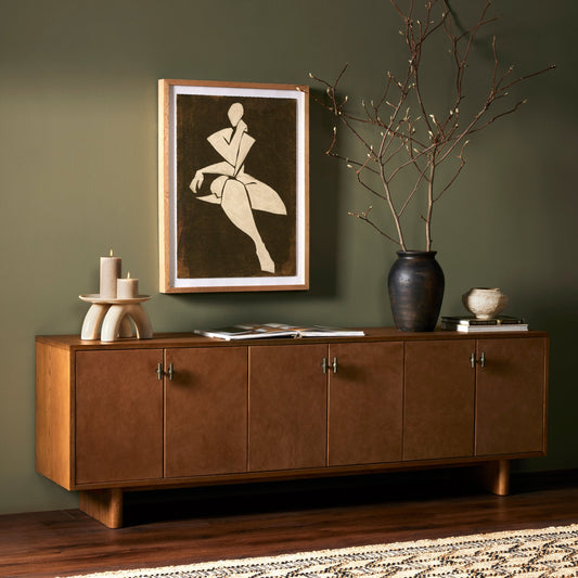 Posada Media Console by Four Hands in amber oak. Made from oak veneer, top grain leather, solid oak in a modern style.