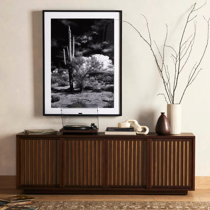 Nyland Media Console by Four Hands in black mahogany. Made from mahogany veneer, solid mahogany, sugar palm in a modern style.