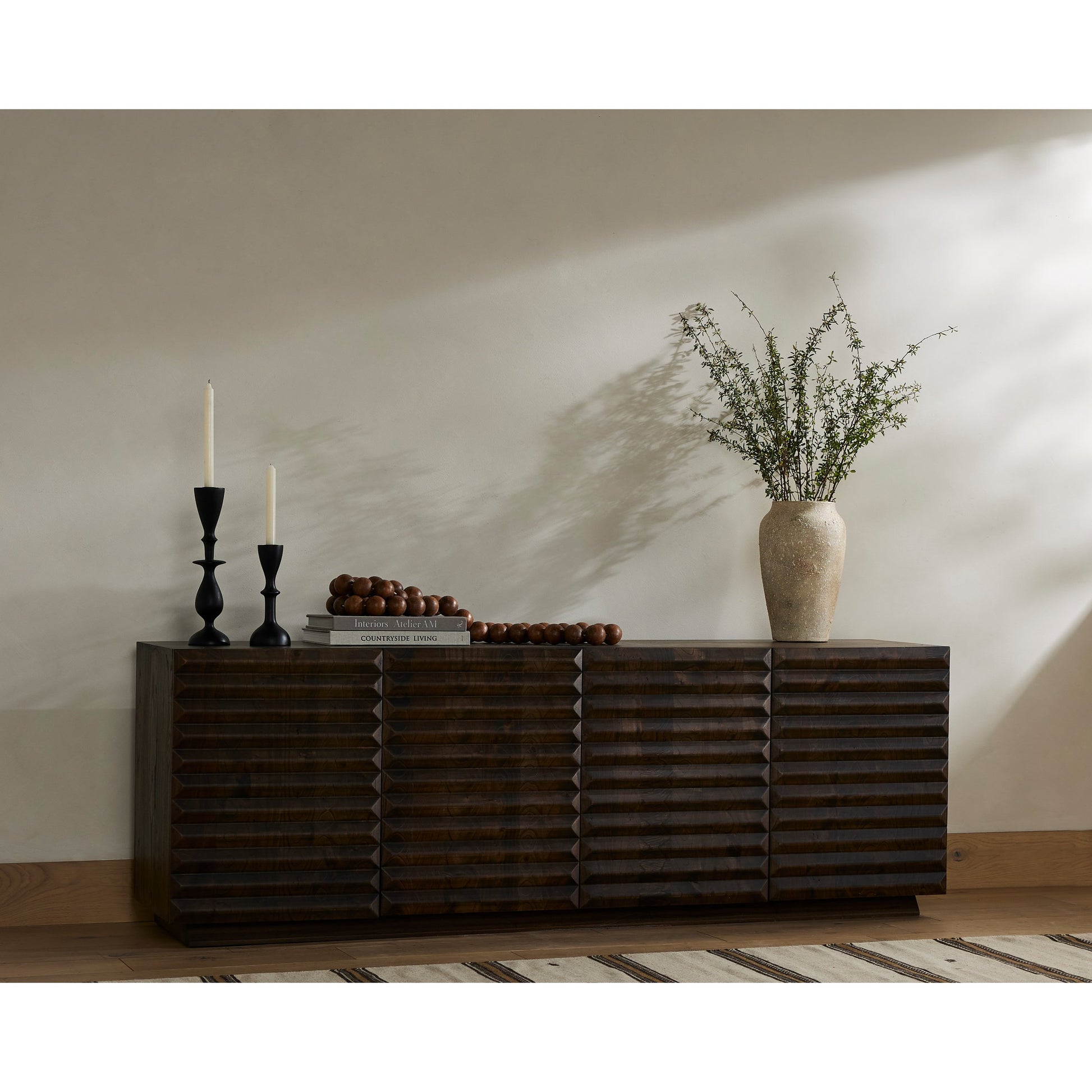 Tussac Media Console by Four Hands in matte brown neem. Made from solid neem wood in a transitional style.