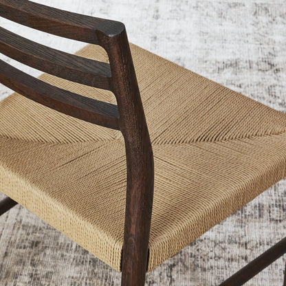 Glenmore Woven Dining Chair by Four Hands. Made from solid oak, rush in a modern style.