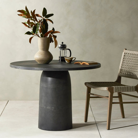 Basil Outdoor Dining Table by Four Hands. Made from aluminum in a modern style.
