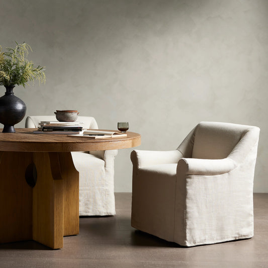 Bridges Slipcover Dining Armchair by Four Hands in brussels natural. Made from 100% flax, linen, 93% polyurethane foam pad, 7% polyester fiber batting in a modern style.