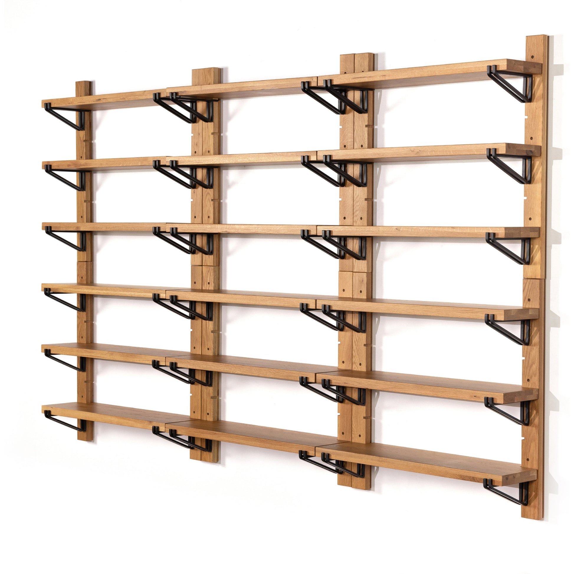 Pivott Shelf by Four Hands in dark iron, natural oak. Made from iron, oak veneer, solid oak in a rustic style.
