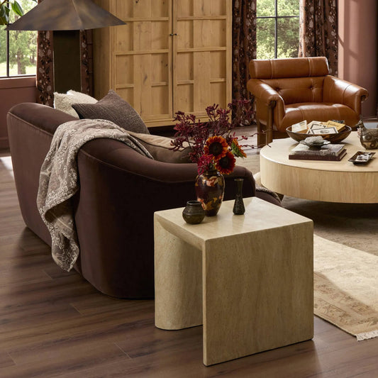 Brad End Table by Four Hands in faux travertine. Made from solid concrete in a transitional style.