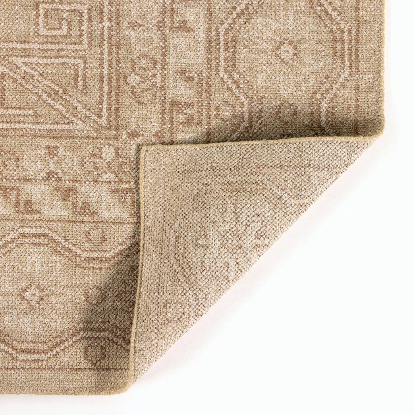003 SI-2534899,SI-2534902 | Closeup | Cortona Hand Knotted Rug by Four Hands. Made from 60% wool, 40% cotton in a unique style.