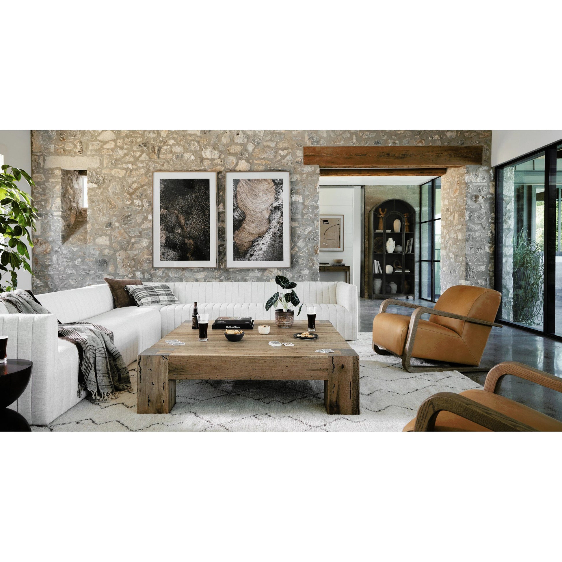 Abaso Coffee Table by Four Hands in ebony rustic wormwood oak. Made from thick oak veneer, engineered hardwood in a transitional style.