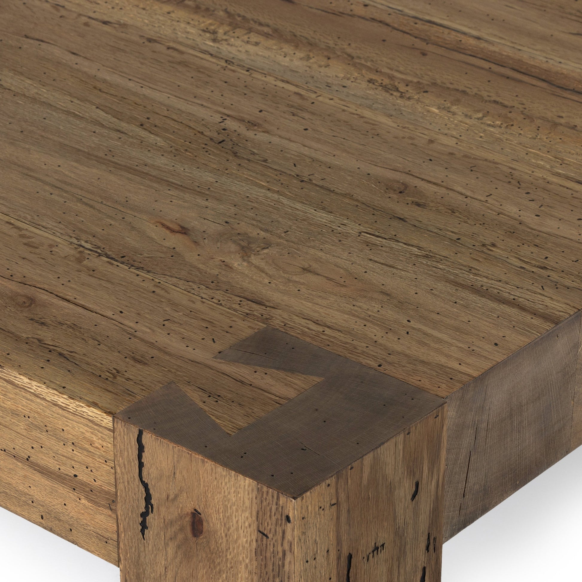 Abaso Coffee Table by Four Hands in ebony rustic wormwood oak. Made from thick oak veneer, engineered hardwood in a transitional style.