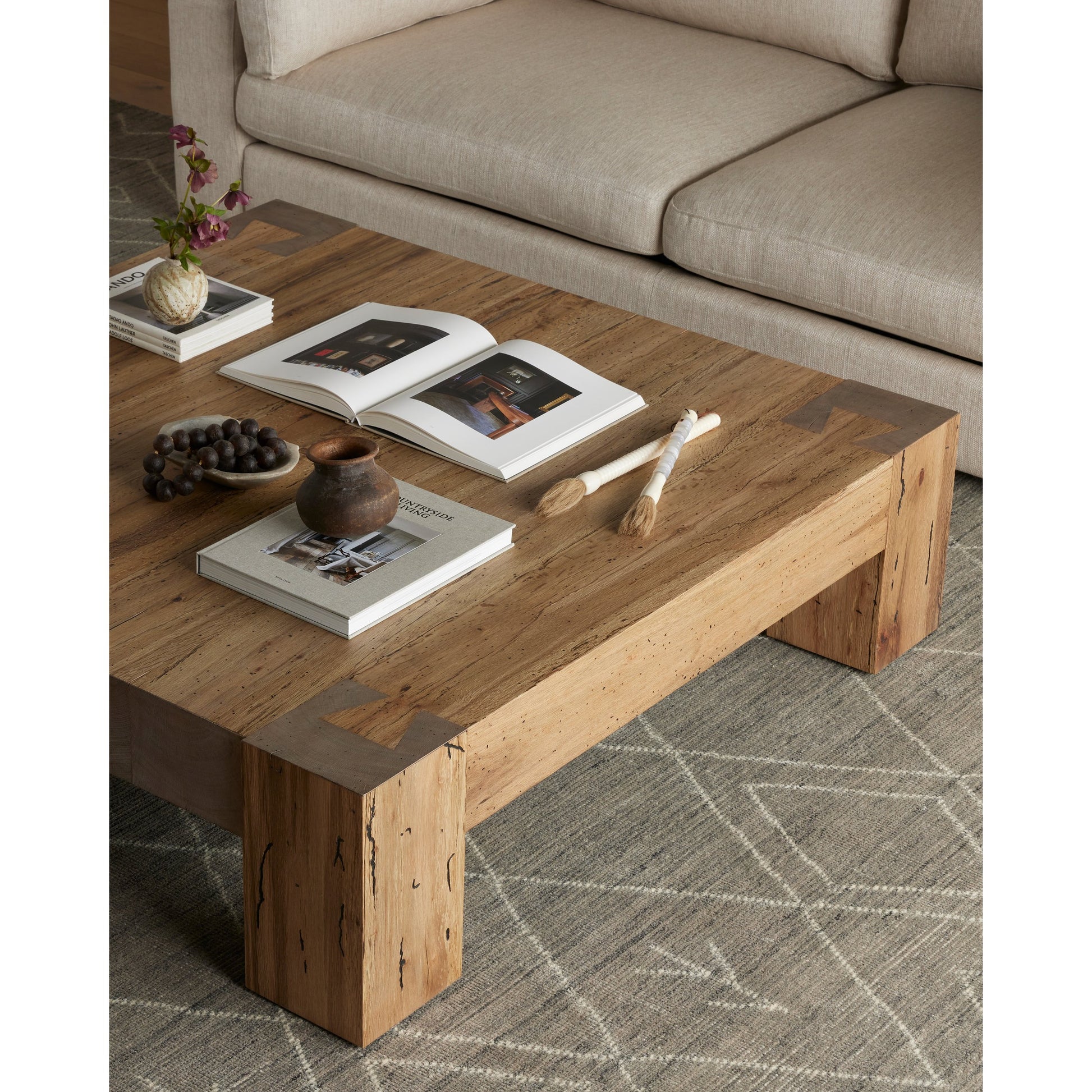 Abaso Coffee Table by Four Hands in ebony rustic wormwood oak. Made from thick oak veneer, engineered hardwood in a transitional style.