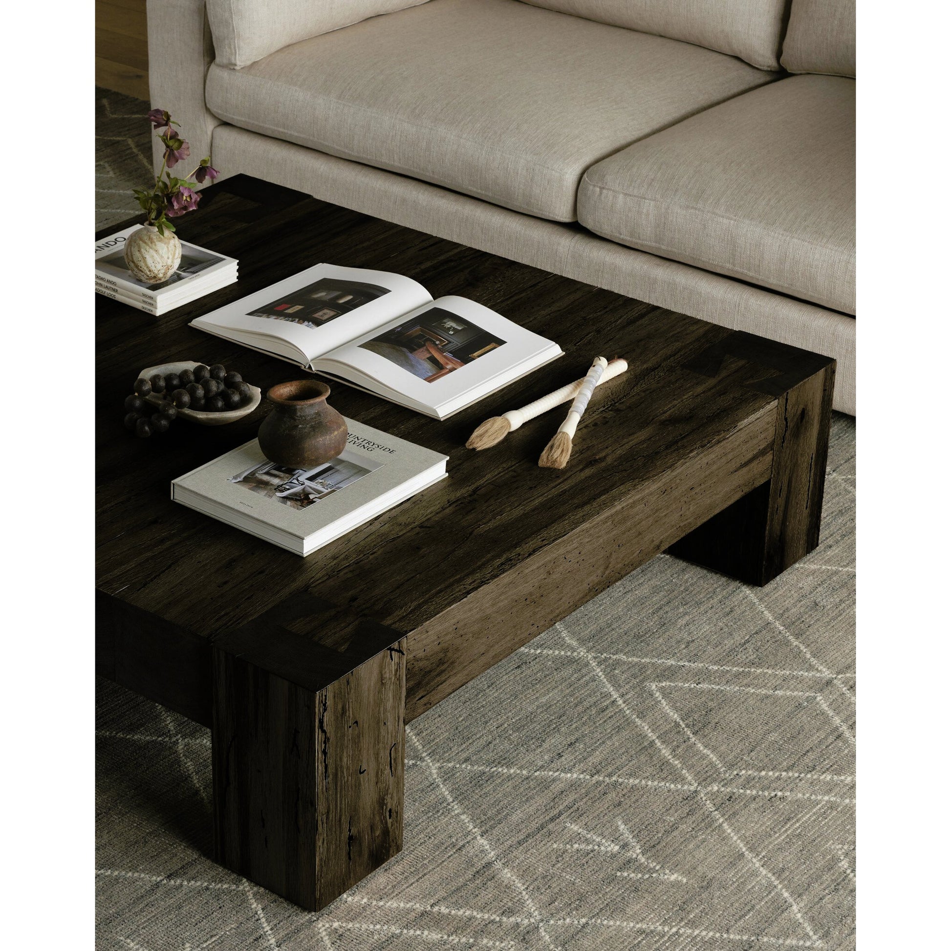 Abaso Coffee Table by Four Hands in ebony rustic wormwood oak. Made from thick oak veneer, engineered hardwood in a transitional style.