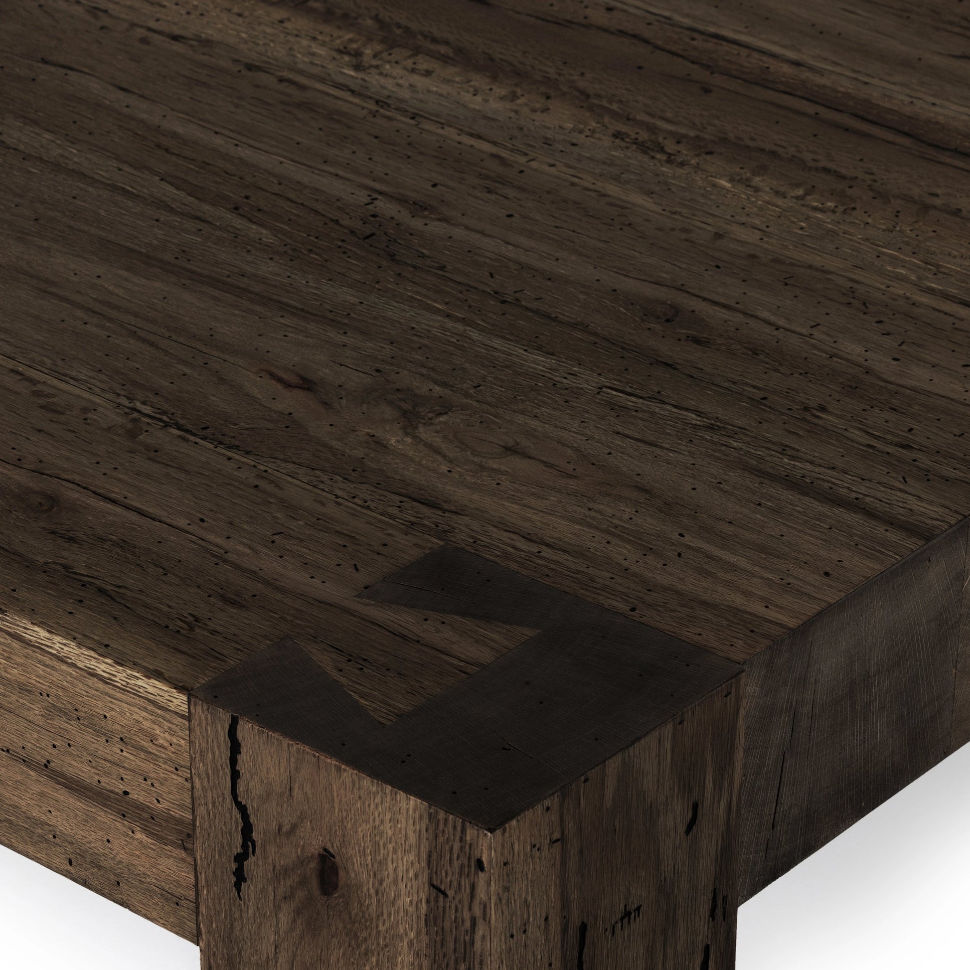 Abaso Coffee Table by Four Hands in ebony rustic wormwood oak. Made from thick oak veneer, engineered hardwood in a transitional style.