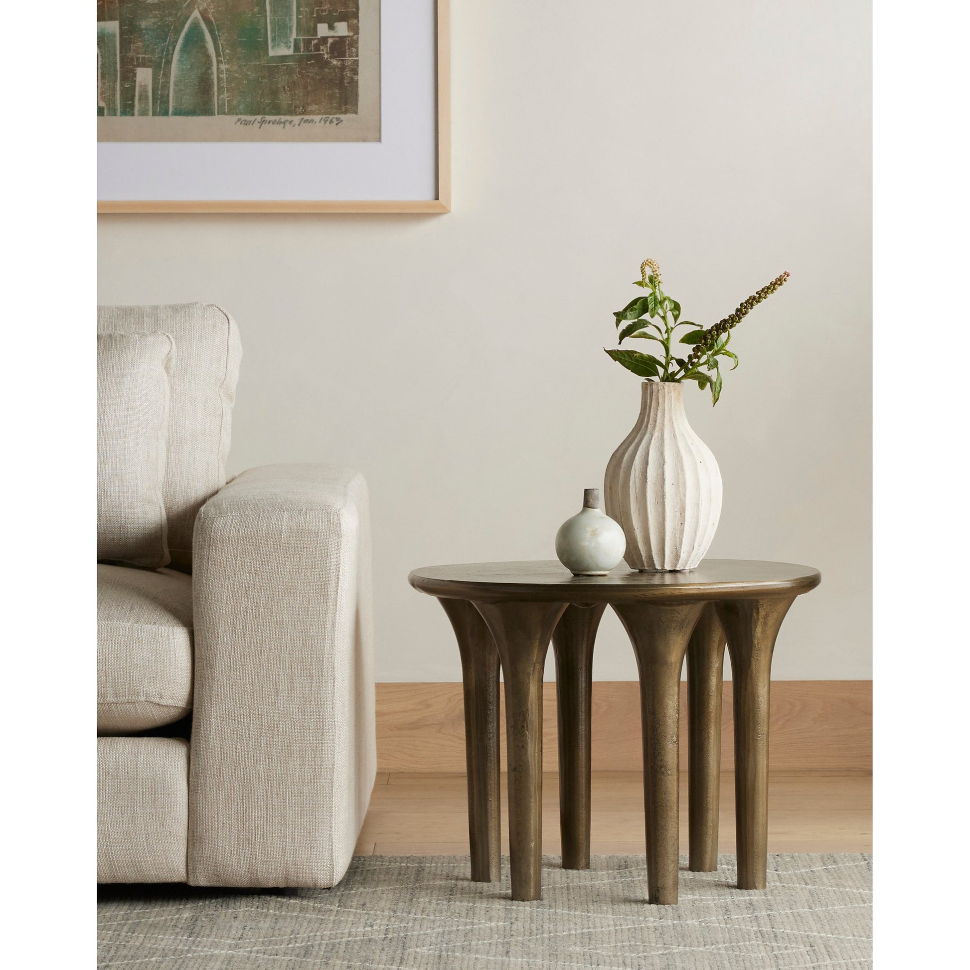 Kelden End Table by Four Hands. Made from aluminum in a modern style.
