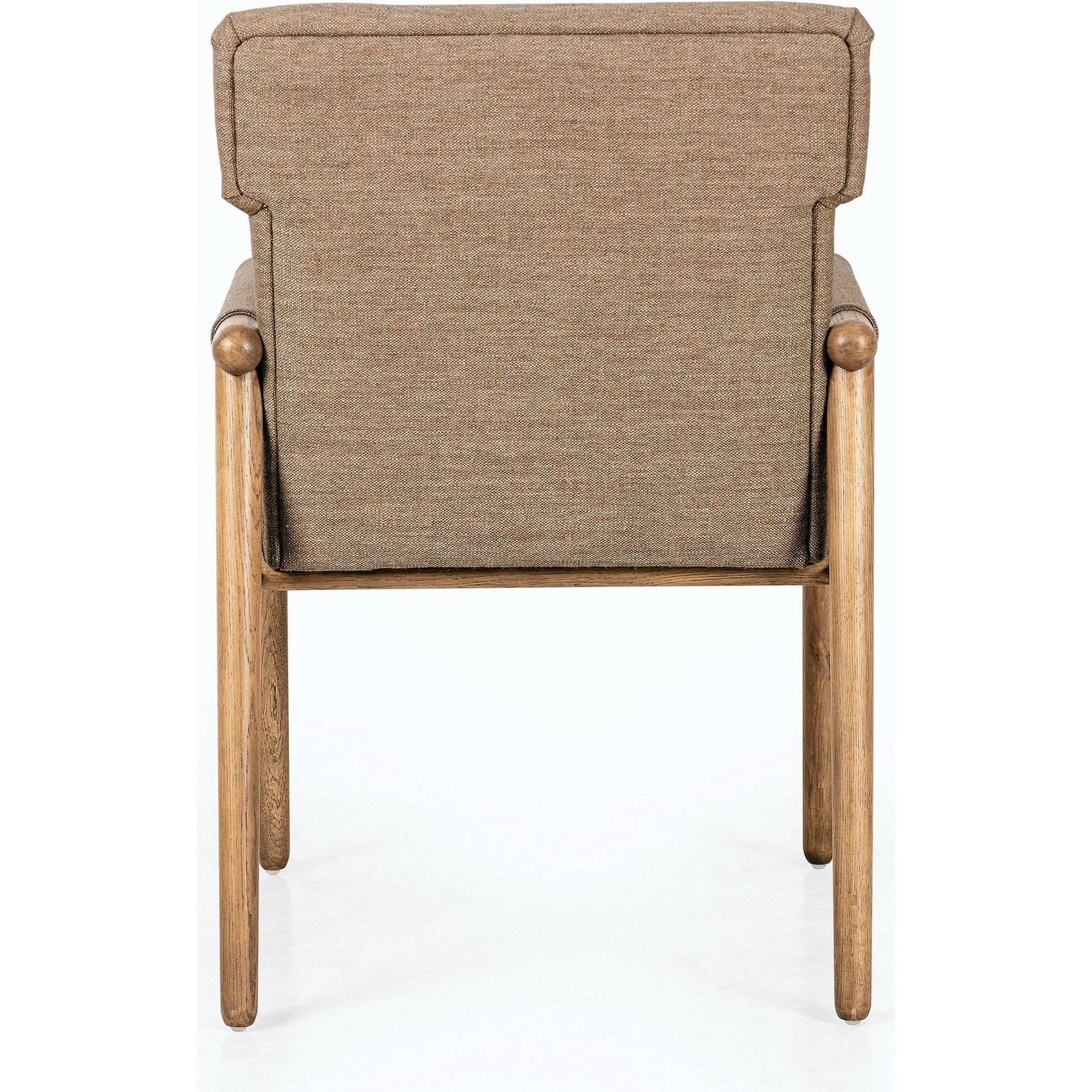 Almada Dining Armchair by Four Hands in valencia camel, distressed natural. Made from top grain leather, solid parawood, 100% polyester in a transitional style.