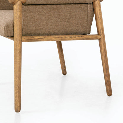 Almada Dining Armchair by Four Hands in valencia camel, distressed natural. Made from top grain leather, solid parawood, 100% polyester in a transitional style.