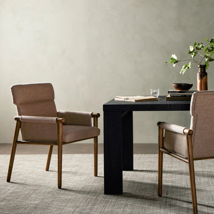 Almada Dining Armchair by Four Hands in valencia camel, distressed natural. Made from top grain leather, solid parawood, 100% polyester in a transitional style.