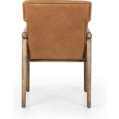Almada Dining Armchair by Four Hands in valencia camel, distressed natural. Made from top grain leather, solid parawood, 100% polyester in a transitional style.
