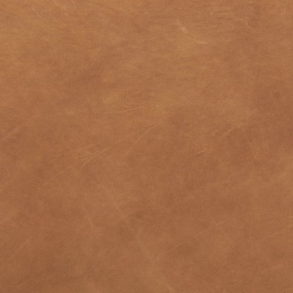 Almada Dining Armchair by Four Hands in valencia camel, distressed natural. Made from top grain leather, solid parawood, 100% polyester in a transitional style.