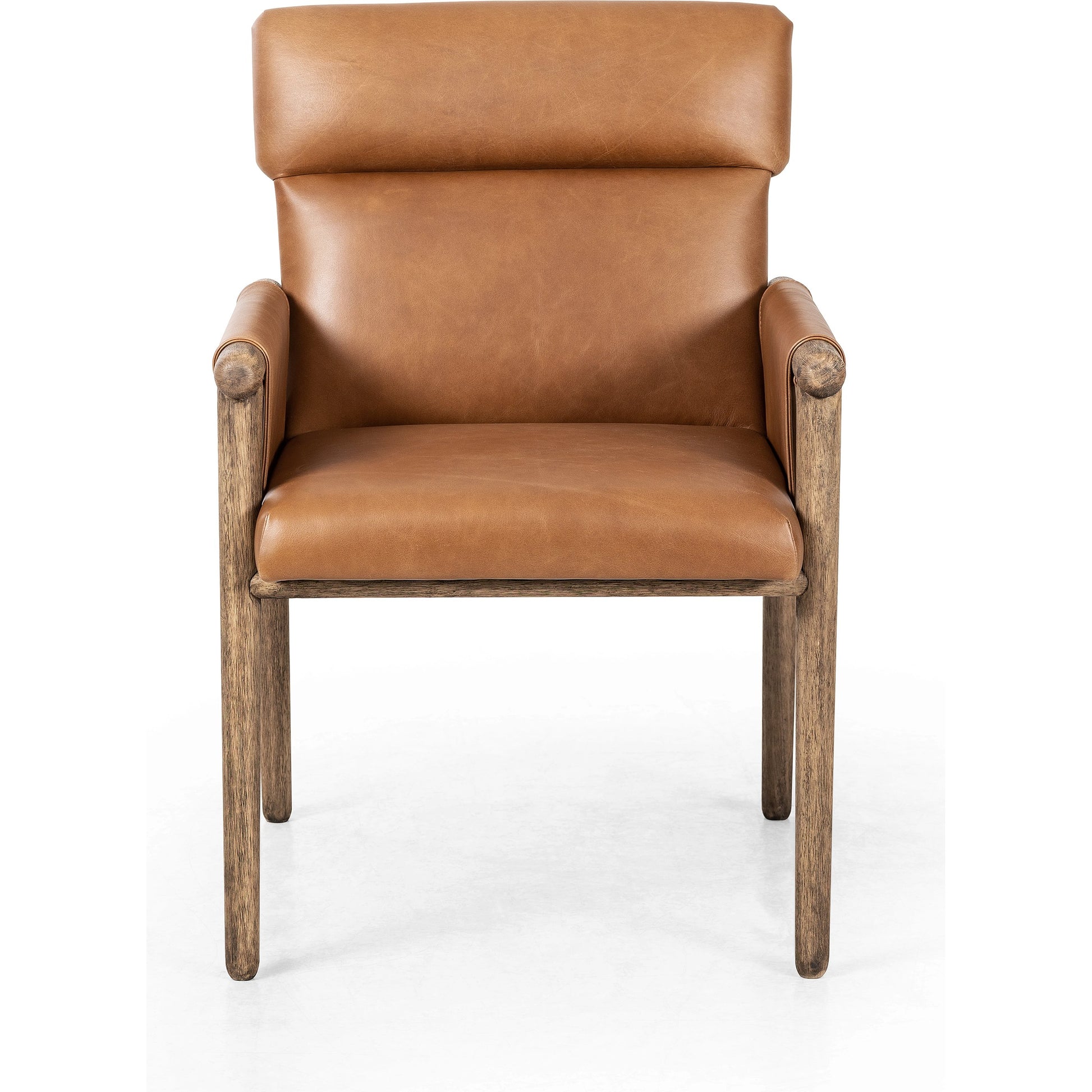 Almada Dining Armchair by Four Hands in valencia camel, distressed natural. Made from top grain leather, solid parawood, 100% polyester in a transitional style.