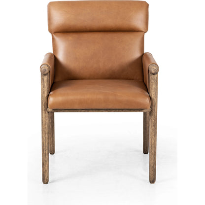 Almada Dining Armchair by Four Hands in valencia camel, distressed natural. Made from top grain leather, solid parawood, 100% polyester in a transitional style.