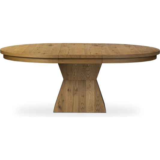 Leif Round Extension Dining Table by Four Hands in aged natural oak veneer. Made from thick oak veneer, solid oak in a transitional style.