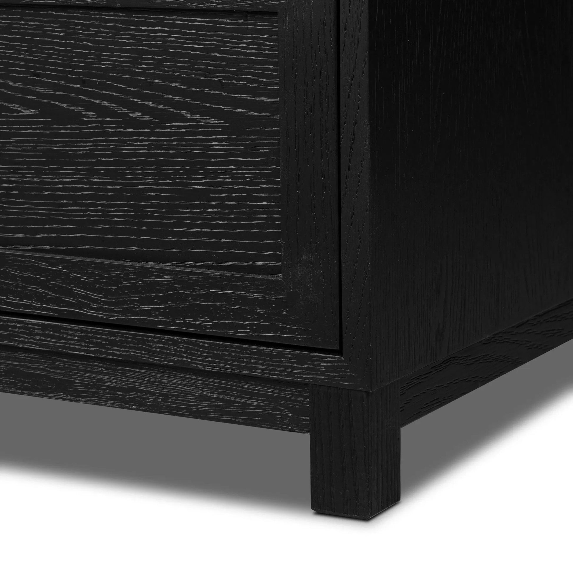 Millie 9 Drawer Dresser by Four Hands in drifted matte black veneer, drifted matte black rubberwood. Made from oak veneer, solid parawood, iron in a modern style.