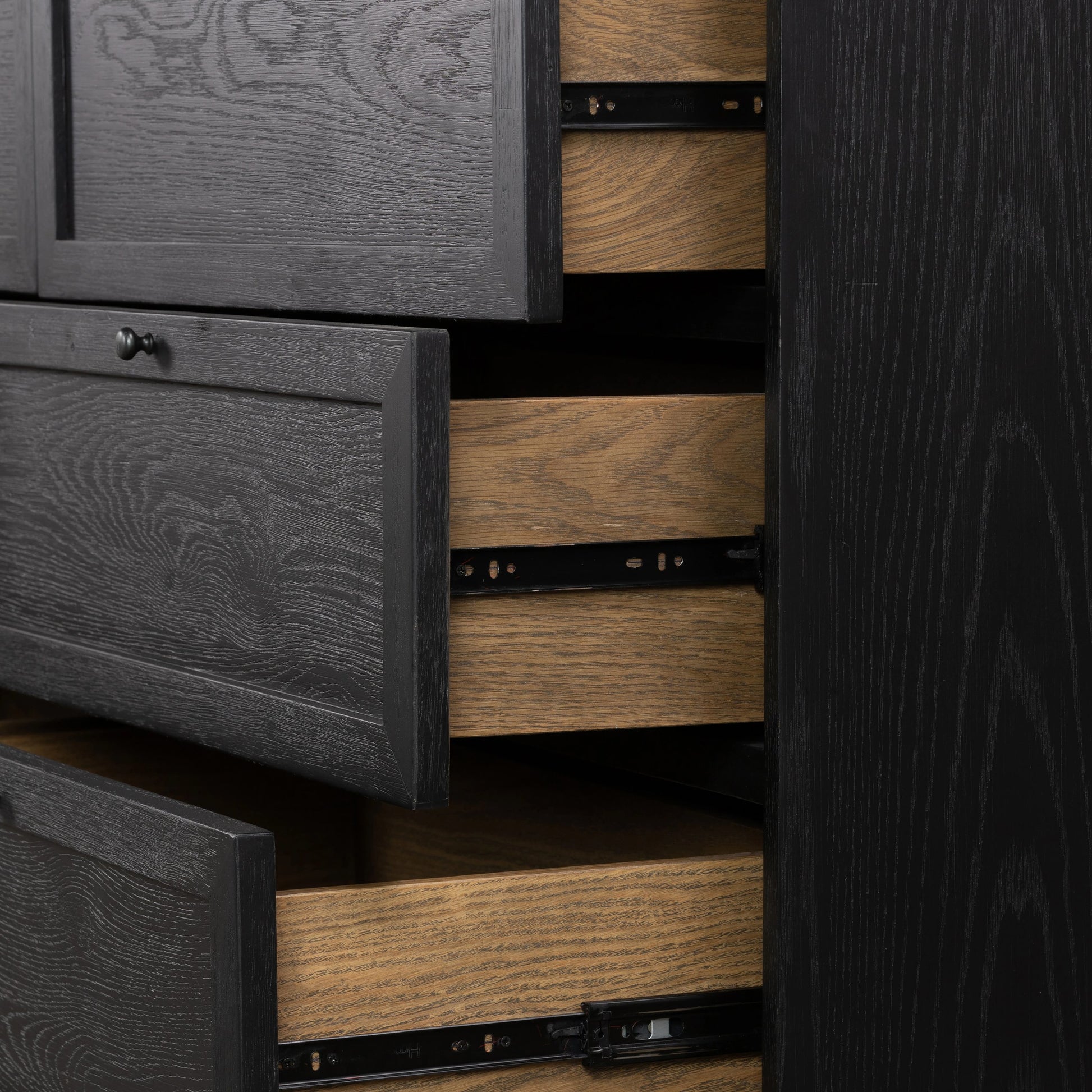 Millie 9 Drawer Dresser by Four Hands in drifted matte black. Made from oak veneer, solid parawood, iron in a modern style.