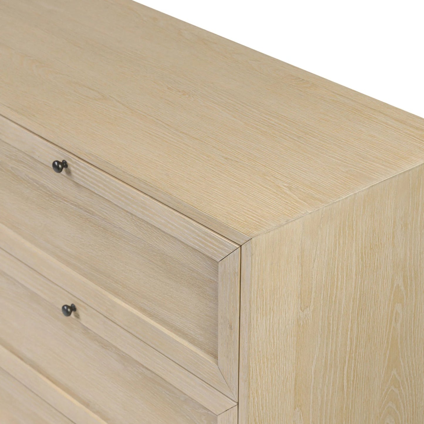 007 SI-2519247 | Closeup | Millie 9 Drawer Dresser by Four Hands in bleached oak veneer, light bleach rubberwood. Made from oak veneer, solid parawood in a transitional style.