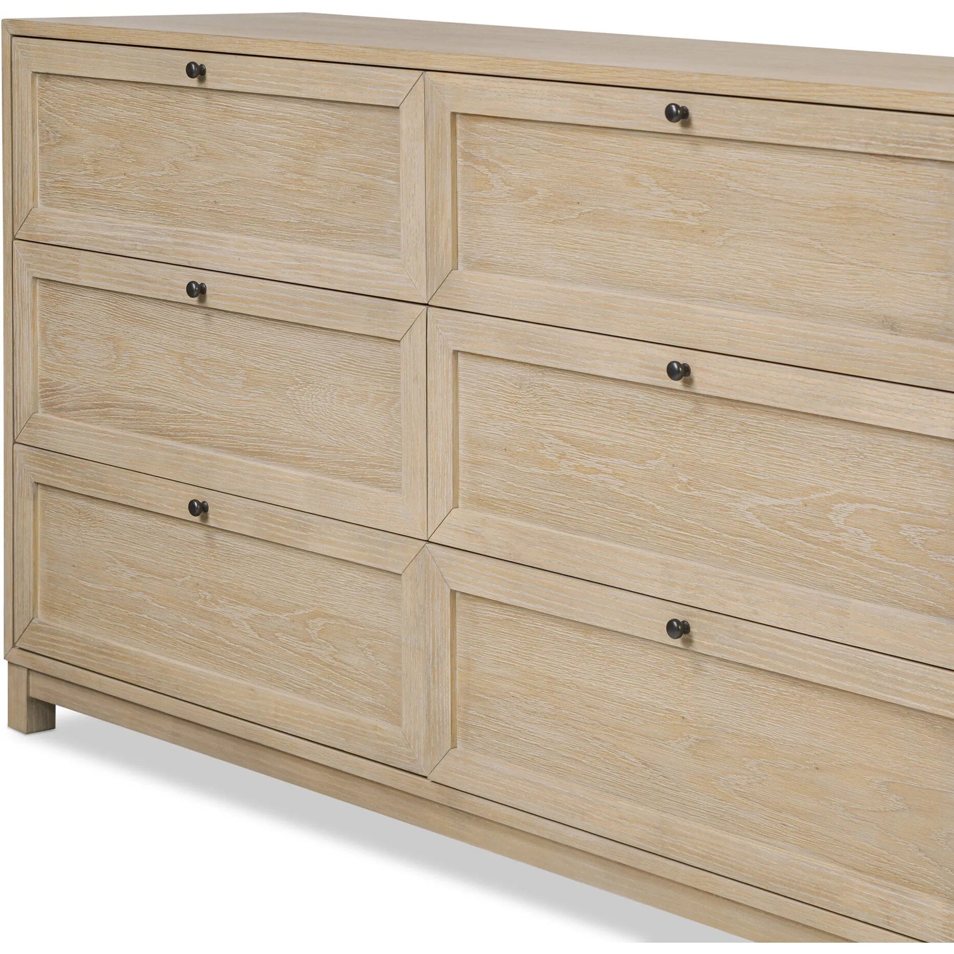 Millie 9 Drawer Dresser by Four Hands in bleached oak veneer, light bleach rubberwood. Made from oak veneer, solid parawood in a transitional style.