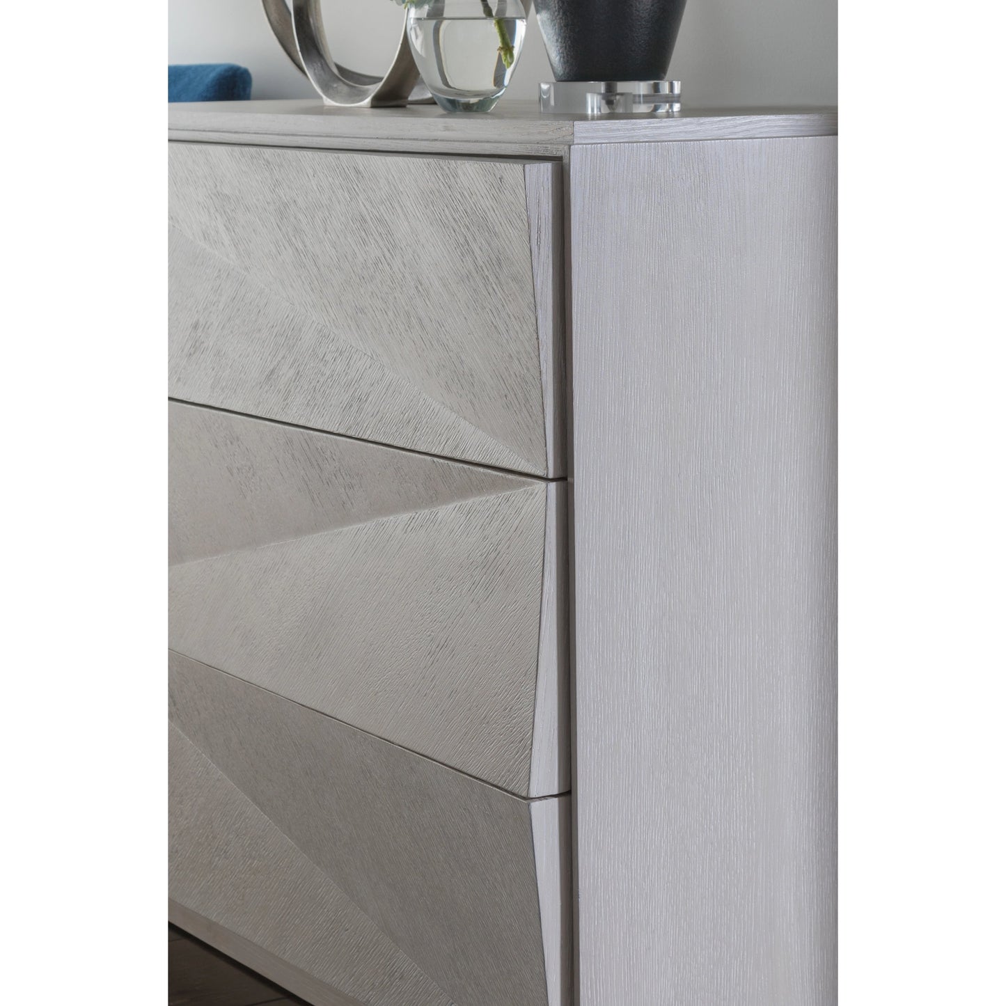 003 SI-2136936 | Closeup | Ziggy Hall Chest by Artistica Home in misty gray. Made from unique in a modern style.