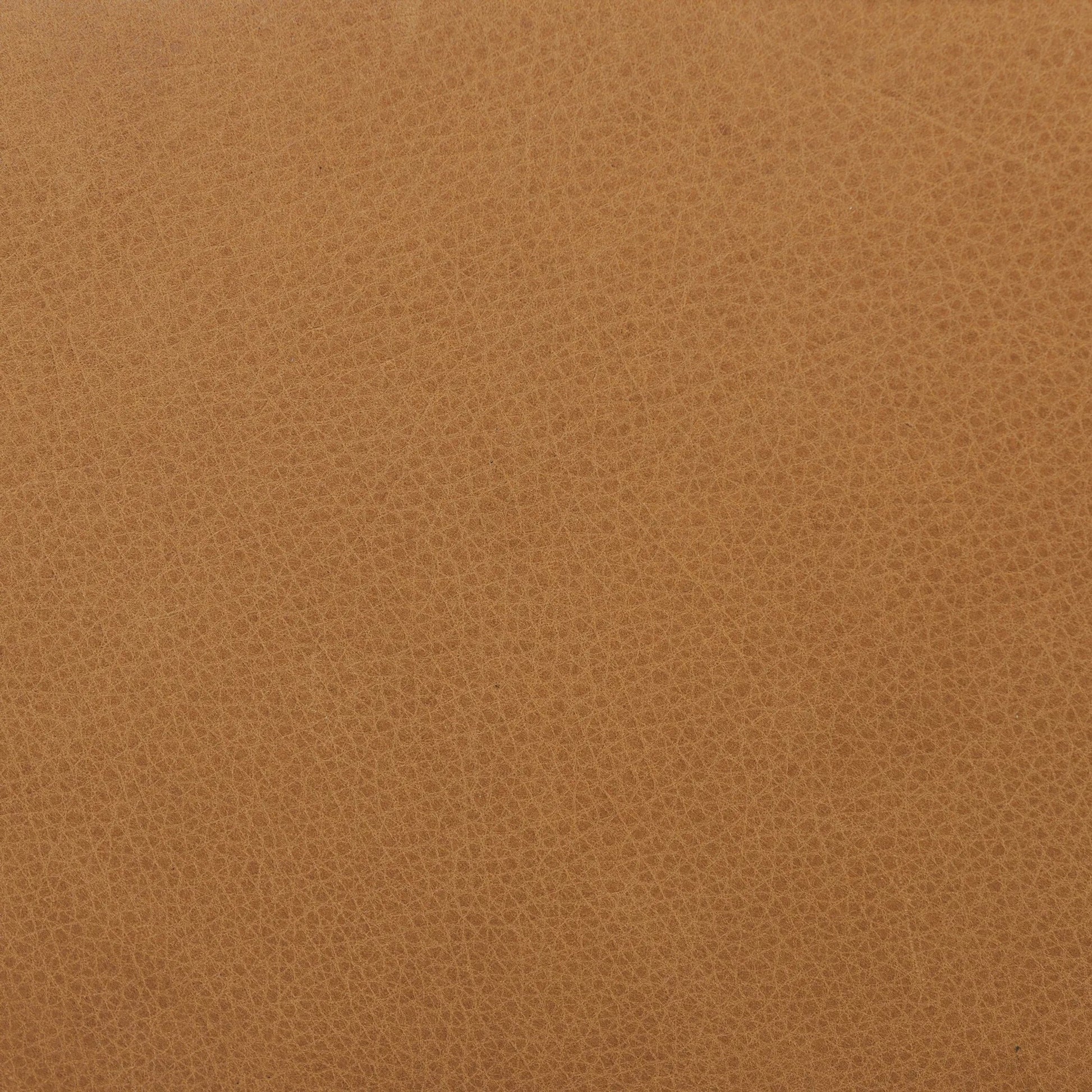 Gerrie Swivel Chair by Four Hands in brickhouse butterscotch. Made from top grain leather in a unique style.