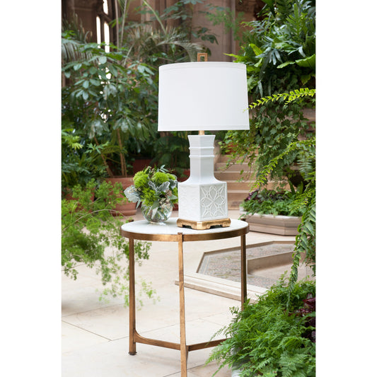 Lila Lamp by Wildwood in white glaze, antique gold leaf. Made from ceramic, porcelain in a transitional style.