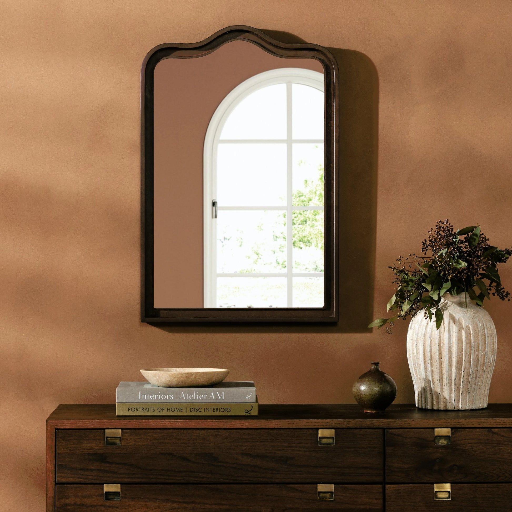 Effie Mirror by Four Hands. Made from iron, mirror, engineered hardwood in a transitional style.