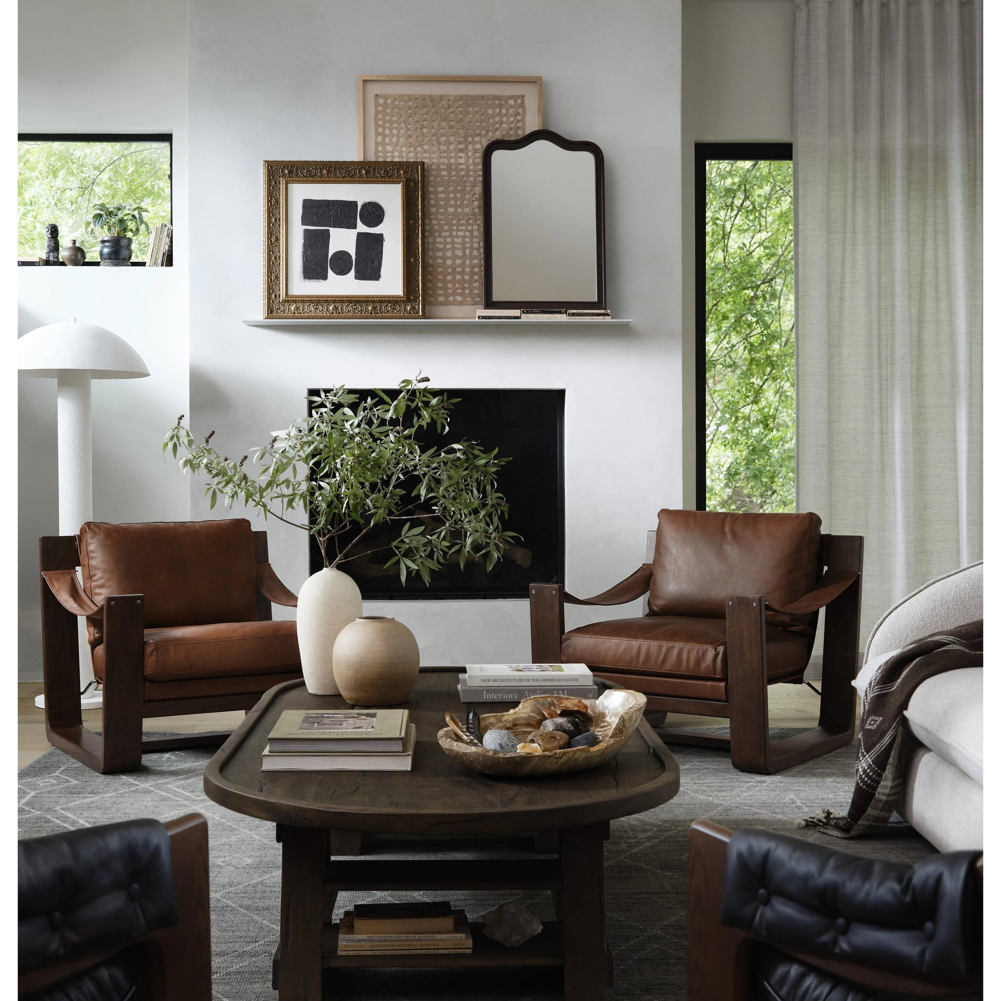 Effie Mirror by Four Hands. Made from iron, mirror, engineered hardwood in a transitional style.