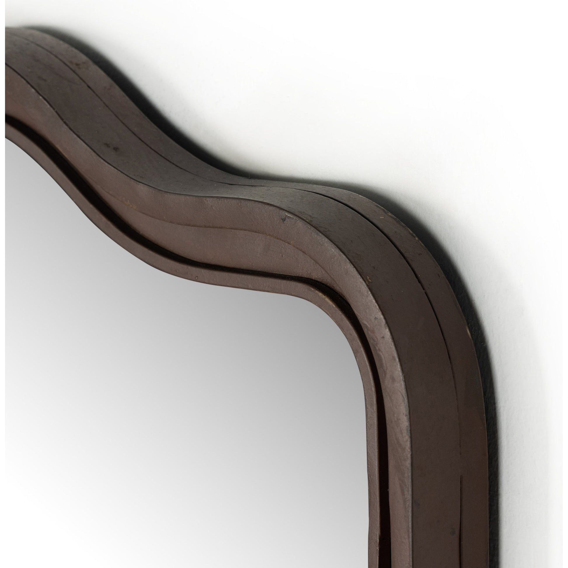 Effie Mirror by Four Hands. Made from iron, mirror, engineered hardwood in a transitional style.